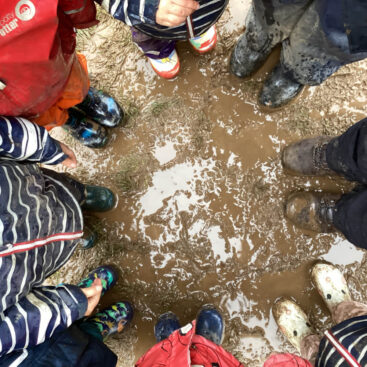 Antony School children muddy puddles