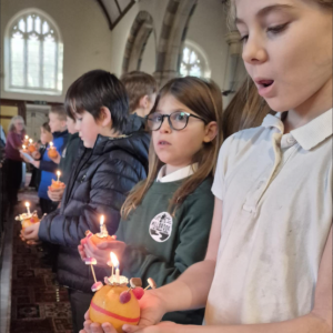 Millbrook Primary School Pupils christingle in church Millbrook Primary School Pupils christingle in church