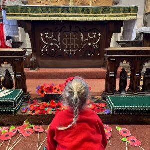 St Dominic Primary Pupil in church