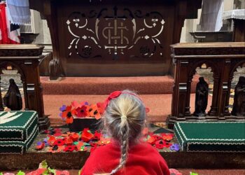 St Dominic Primary Pupil in church