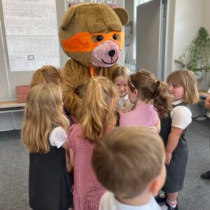 St Dominic Primary Pupils with Fred bear from Clear