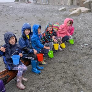 St Germans Primary Pupils with buckets on the beach