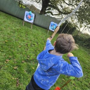 St Mabyn School pupil practising archery St Mabyn School pupil practising archery