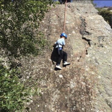 St Martin's Primary School Pupil rock climbing
