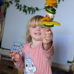 St Martin's Primary School pupil showing veg kebab