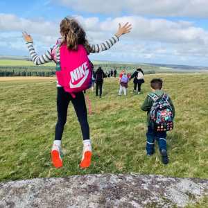 St Petrocs Primary School Pupil jumping on the moor St Petrocs Primary School Pupil jumping on the moor