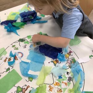 St Winnow Primary School Pupil doing collage