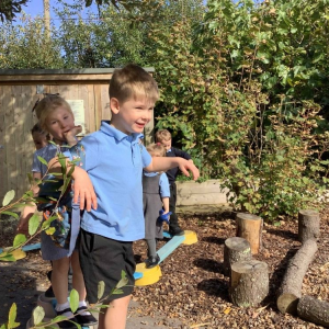 St Winnow Primary School Pupils balancing outdoors