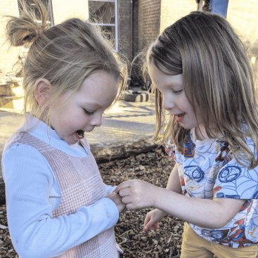 Wild Warrios Nursery Children playing together outdoors