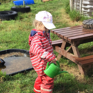 Acorns Nursery Child playing outside