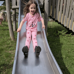 St Nicolas Preschool pupil on a slide