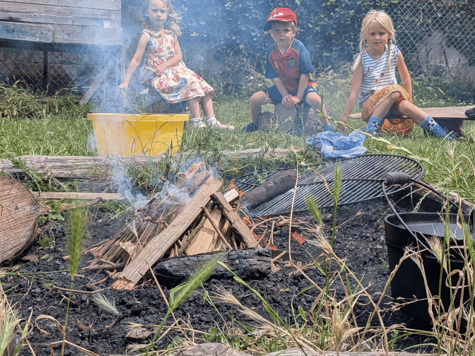 St Nicolas Preschool pupils around the fire